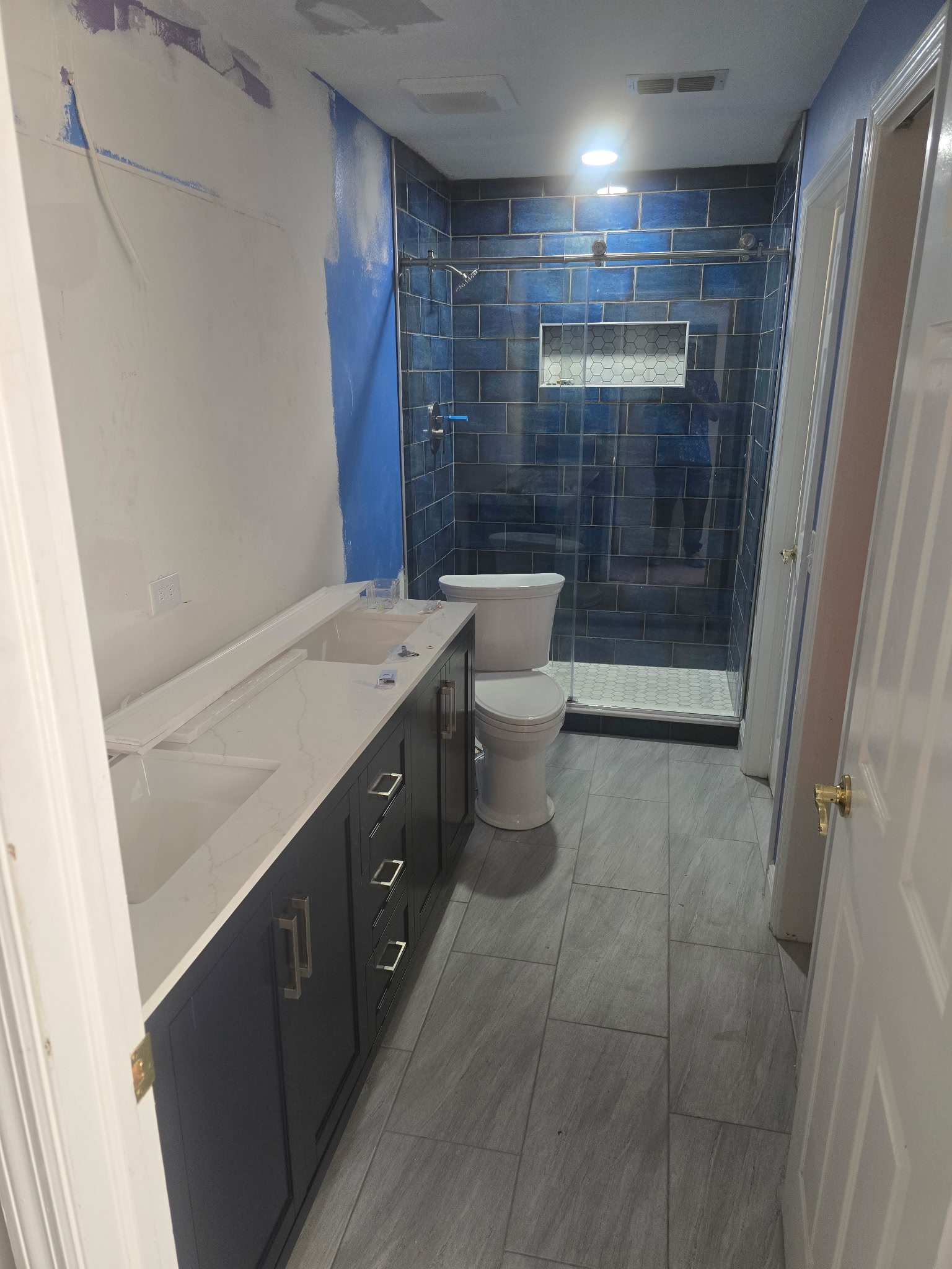 Unique blue bathroom remodel  Thumbnail